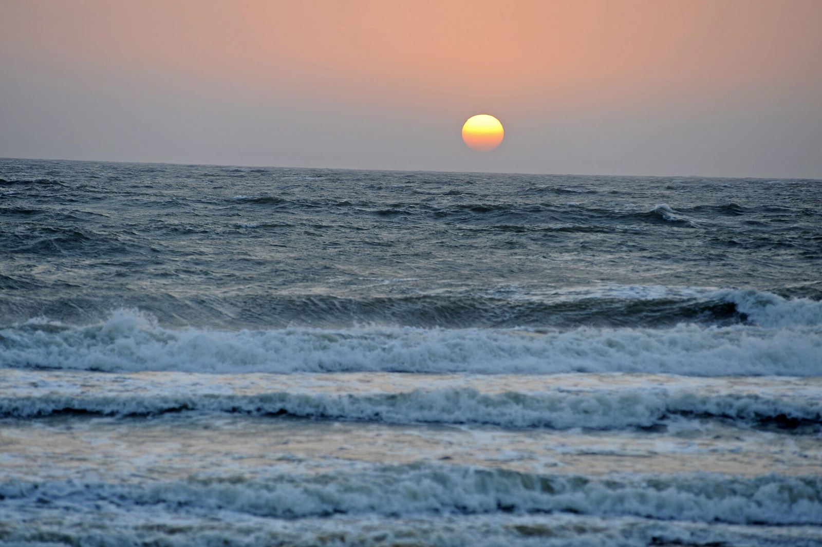 Sunset over the sea from Candolim beach, Raht Aashyana Lakhanpal, Candolim, Goa